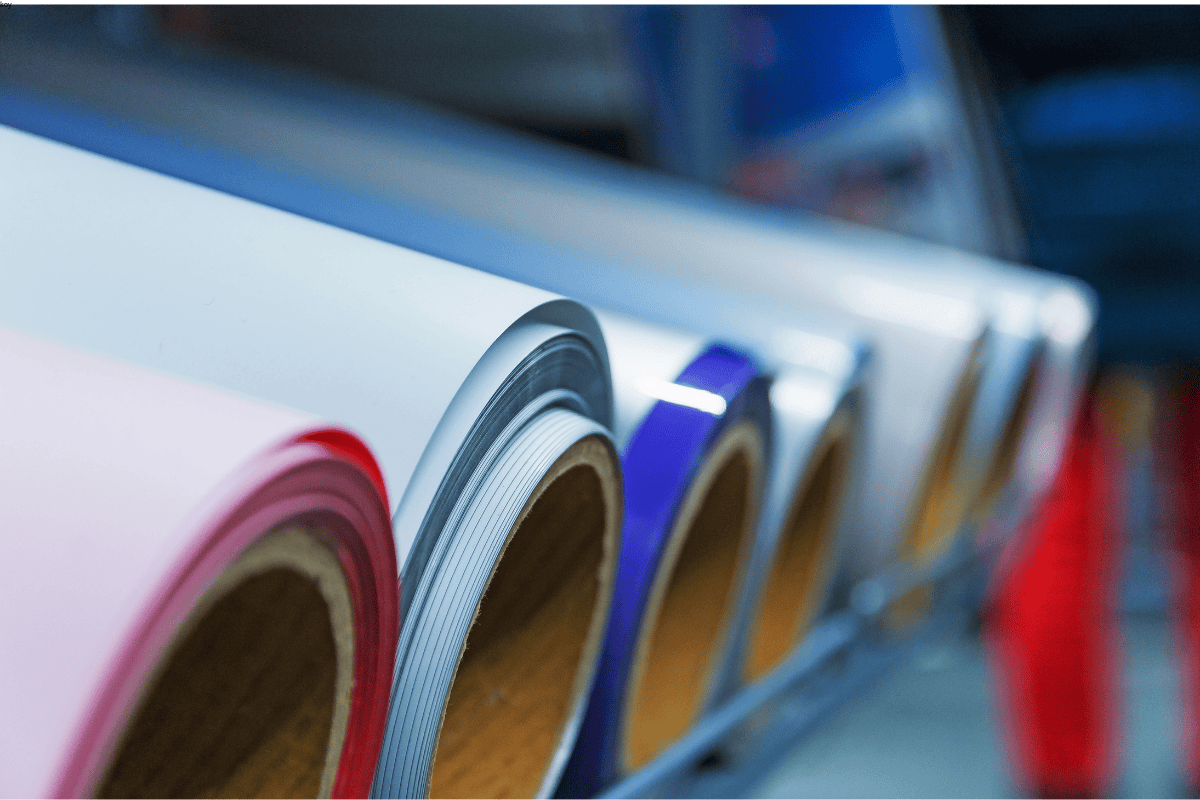 Close-up of colorful extrusion and adhesive lamination film rolls for flexible packaging