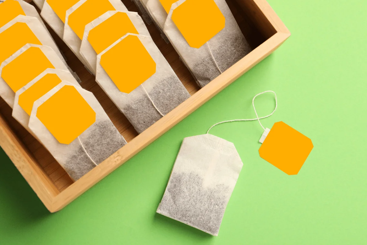 String and tag tea bags packed in a wooden box, produced by IMA packaging machine
