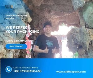 Koy Wang, author of XLDflex Insights & Trends blog, standing in front of a rock formation, representing XLD flexible packaging expertise