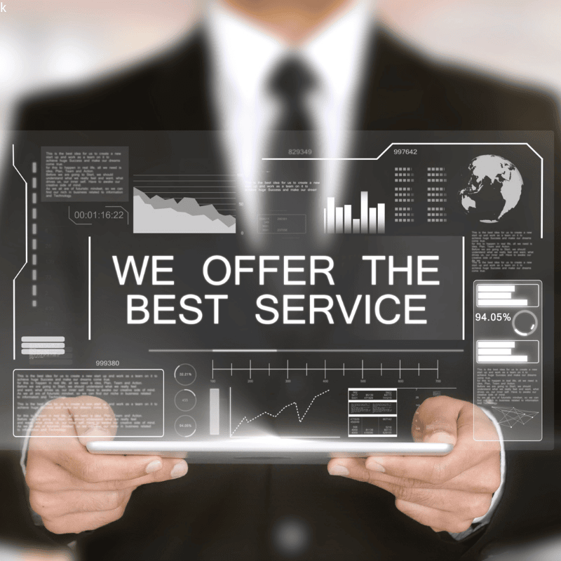 Businessman holding a digital interface with 'We Offer the Best Service' message