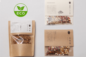 Eco friendly kraft paper pouches with clear windows for tea, soup, and granola packaging