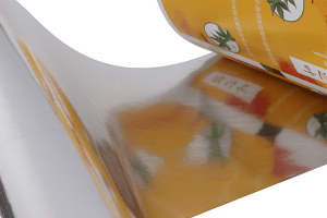 Laminated paper roll showing metallic layer for enhanced moisture barrier in tea and food packaging applications.