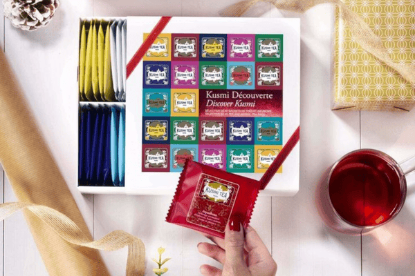 Assorted tea sachets in colorful laminated paper packaging