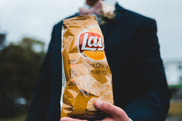 Snack packaging example showing customized flexible packaging designed for different snack types such as chips and baked snacks.