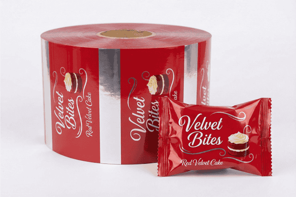 Custom printed cake packaging rollstock and single-serve wrapped cake snack produced by XLD.