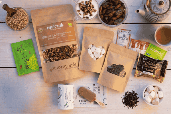 Compostable stand up pouch packaging used for granola, tea, snacks, and organic food products.