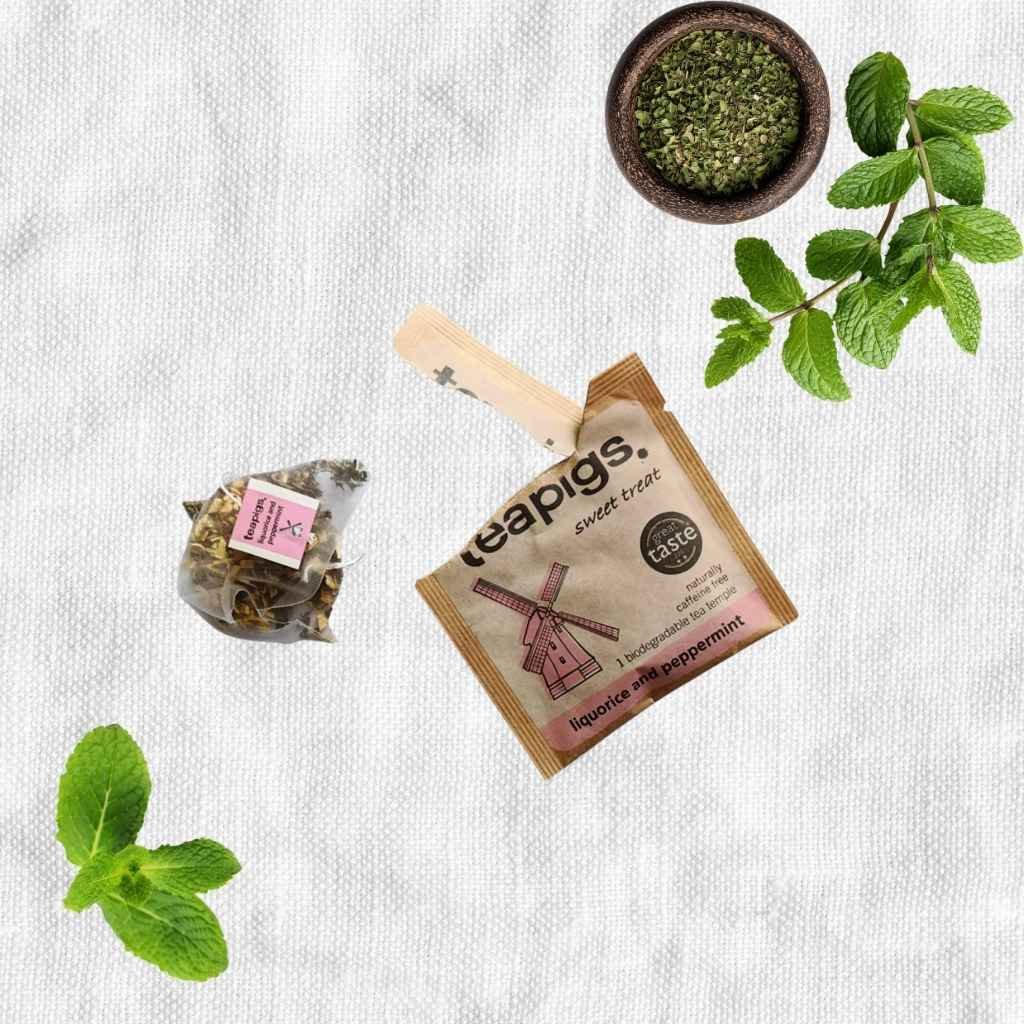 Custom printed kraft paper herbal tea sachet with brand logo, transparent window, and loose leaf visibility